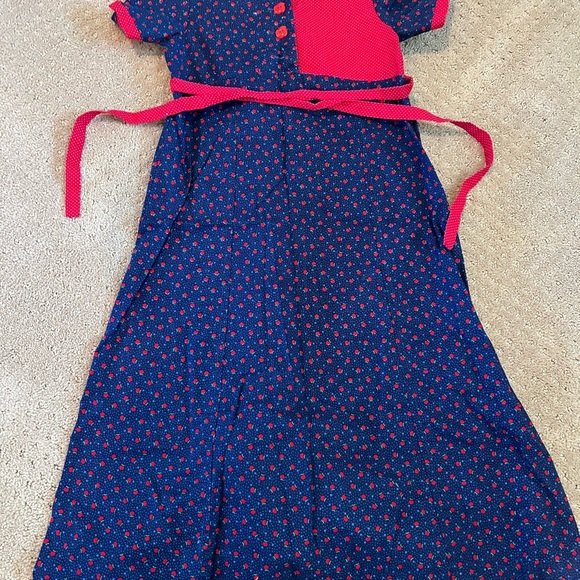 Handmade girls dress.  Material is navy blue with small red apple print. - Picture 2 of 2